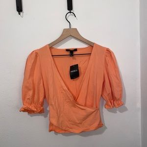 orange puffed shoulder wrap v neck